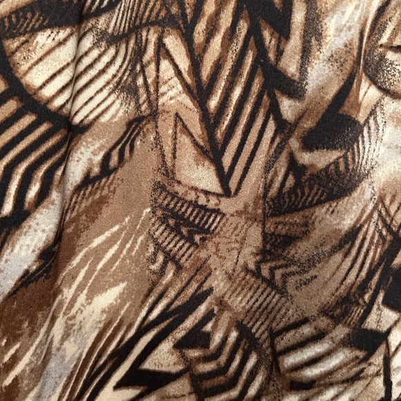 Nice print metal gold decor on front flows nice on the body feels good on - Picture 2 of 3